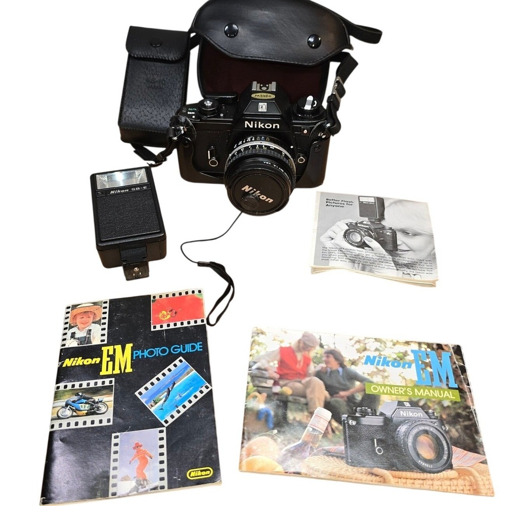 Nikon EM 35mm Camera body lens series e flash‎ cases for camera manuals timer